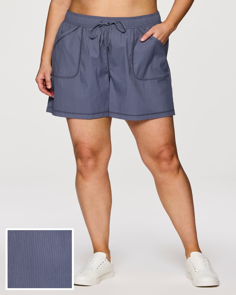 Front of a model wearing a size 2X Plus Birdie Textured Walking Short in Smoke Blue by RBX Active. | dia_product_style_image_id:352943